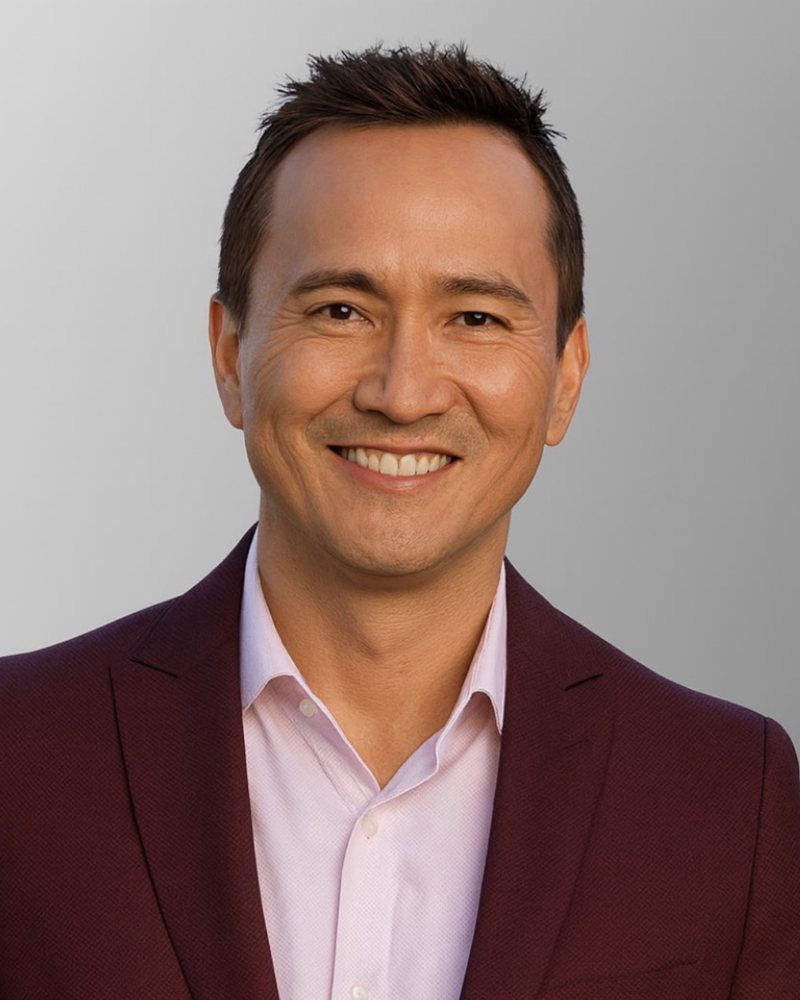 Kiri Suykry, California real estate broker, smiling in natural light